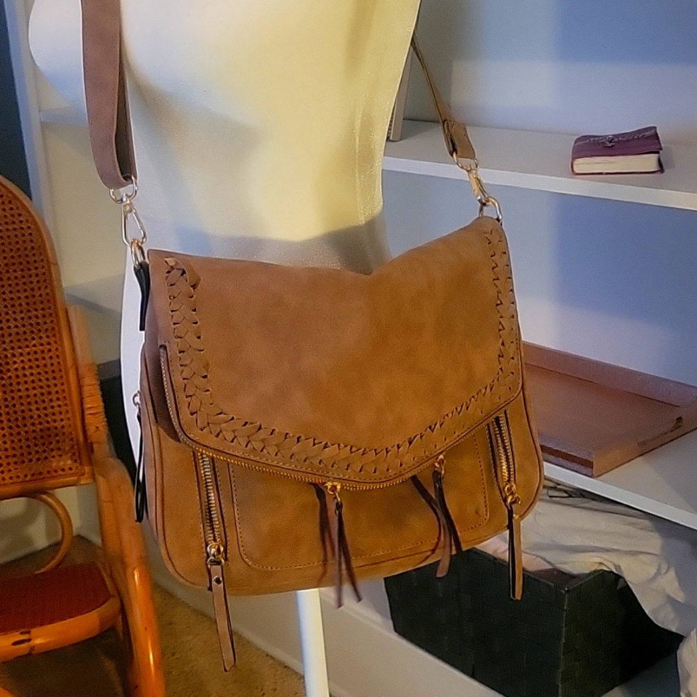 Brown swayed cross body with Oh so many pockets